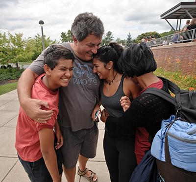 Student with their family on move in day